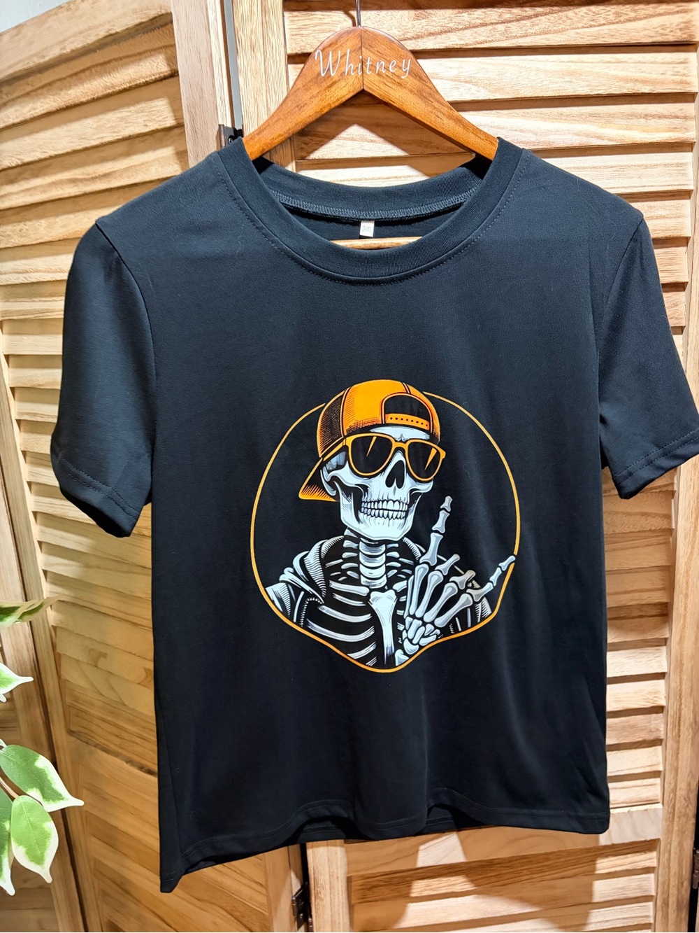 Black Graphic Tee with Orange Skull Design